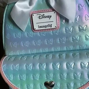 Loungefly Minnie Mouse Embossed Ruffle Ear Backpack And Wallet Loungefly | Bags | Loungefly Minnie Mouse Embossed Ruffle  main image 3